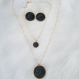 Large black and gold leather necklace with chic gold stud earrings jewelry set