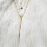 Gold long horn necklace